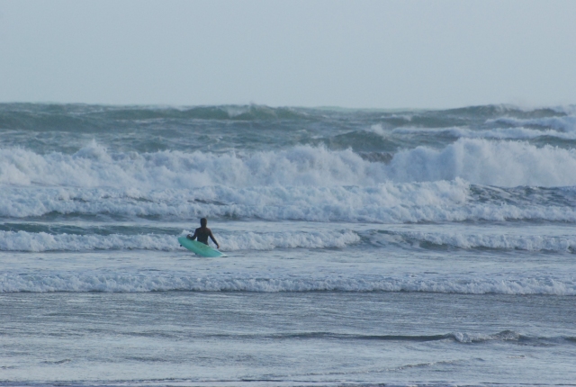 surfing in Raglan, New Zealand